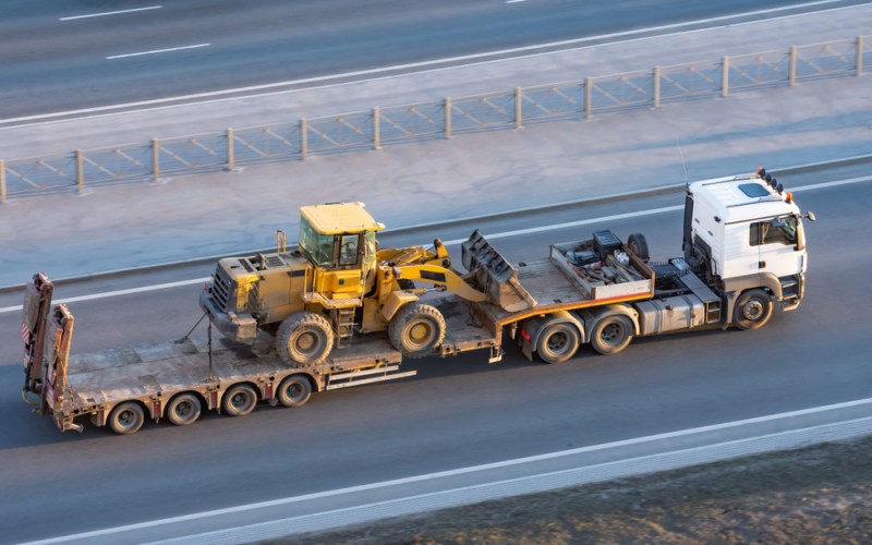 Truck,With,A,Long,Trailer,Platform,For,Transporting,Heavy,Machinery, Truck,With,A,Long,Trailer,Platform,For,Transporting,Heavy,Machinery,
